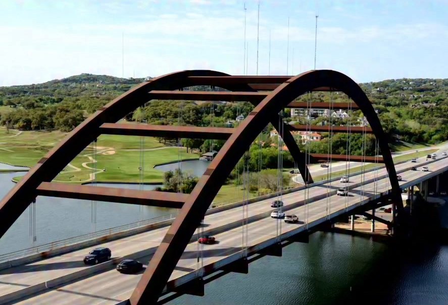 Arched bridge over a lake in the Austin area